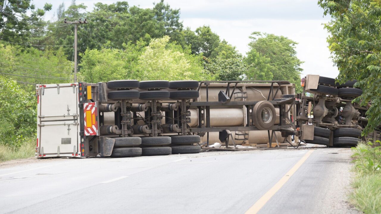 Truck Fallen On Its Side Blocking The Road