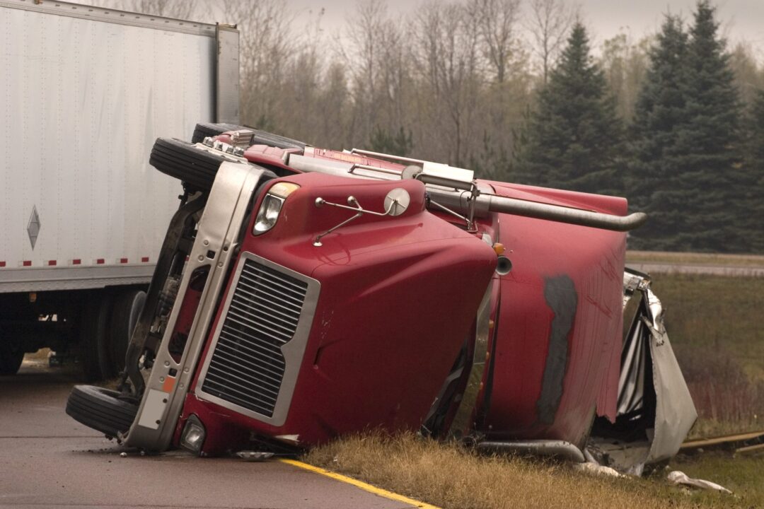 Vehicle Accident - Truck Turned Over Semi